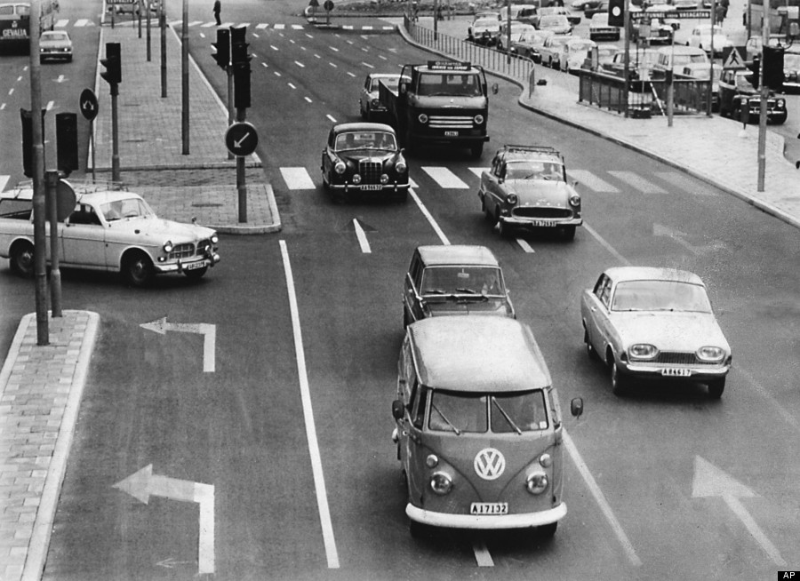 Traffic in a Swedish town is seen still moving on the left hand side of the road before the conversion to right-hand-drive with direction arrows already painted indicating the directions for right-hand-drive, August 12, 1967. (AP Photo)