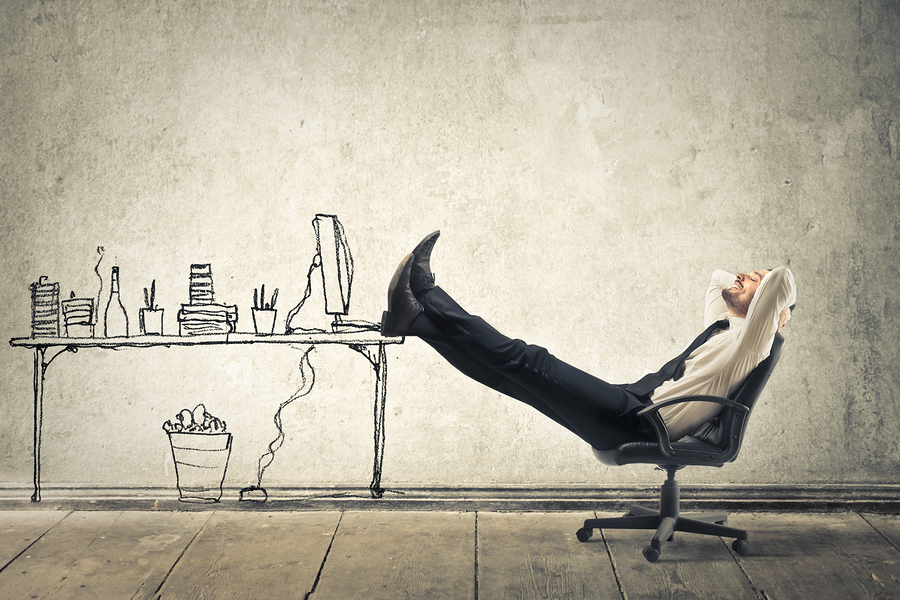 young businessman relaxes sitting in the office