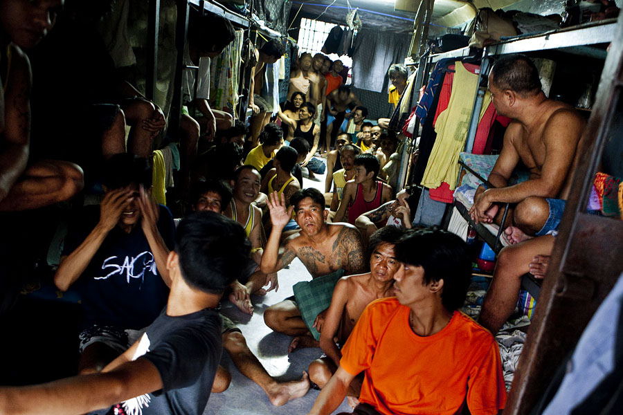Prisoners gather in their cells four times each day for a headcount. Although Taguig Jail operates at 250% of capacity, it is one of the least crowded prisons in the Manila area.