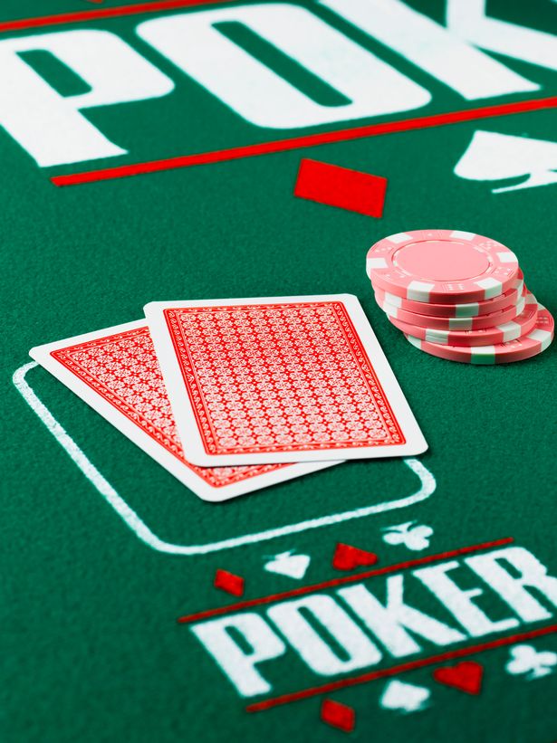 gambling-chips-and-cards-on-poker-table