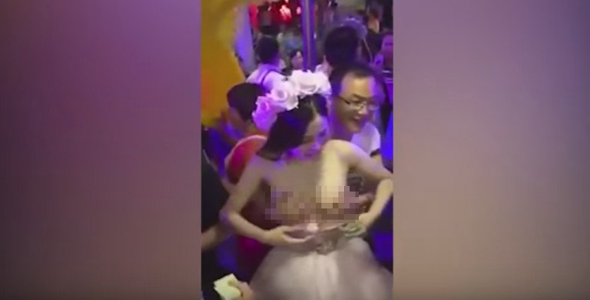 new-bride-allows-guests-to-grope-her-chest_1